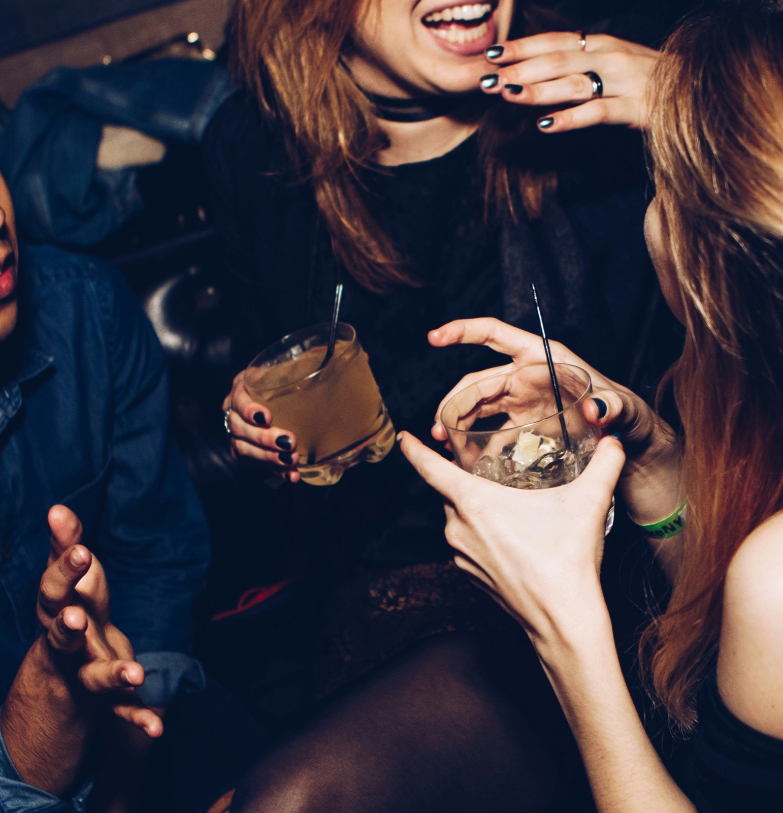 Friends sharing drinks on a night out